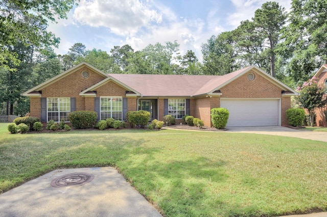 4610 Mulberry Creek Dr, Evans, GA 30809 - ranch-style house featuring brick siding, a front lawn, a garage, and concrete driveway