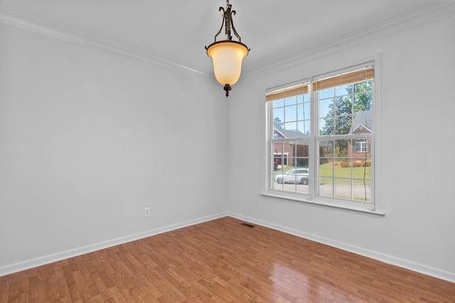 4942 Marble Dr, Evans, GA 30809 - spare room with baseboards, ornamental molding, and wood finished floors
