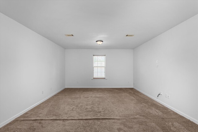 4942 Marble Dr, Evans, GA 30809 - spare room featuring baseboards, carpet flooring, and visible vents
