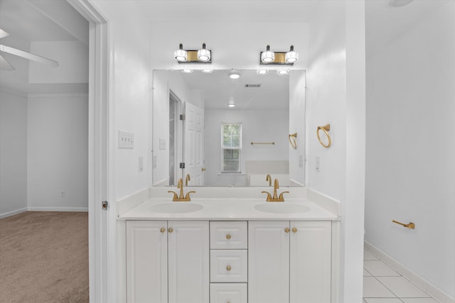 4942 Marble Dr, Evans, GA 30809 - bathroom with double vanity, baseboards, visible vents, and a sink