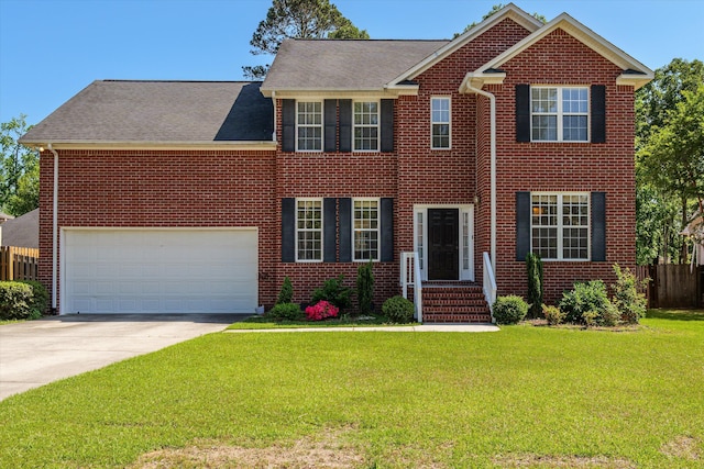 4942 Marble Dr, Evans, GA 30809 - colonial house featuring concrete driveway, brick siding, and a front yard