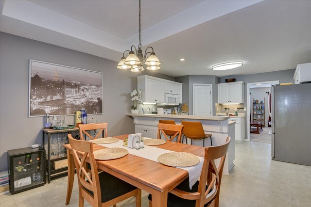 240 Full Circle Dr, Evans, GA 30809 - dining area featuring a chandelier