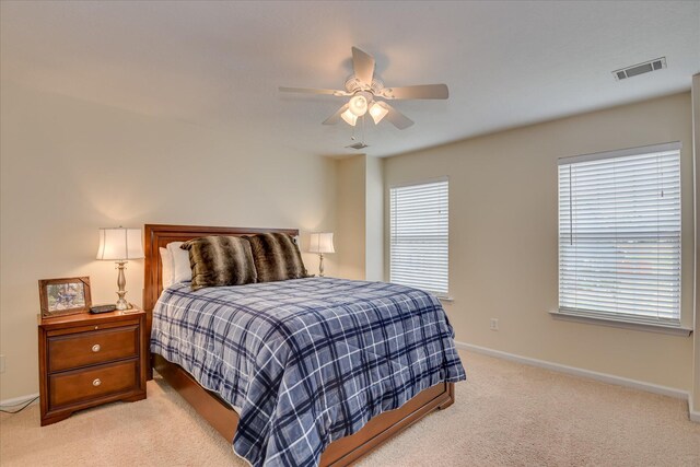240 Full Circle Dr, Evans, GA 30809 - bedroom with light colored carpet, multiple windows, and ceiling fan
