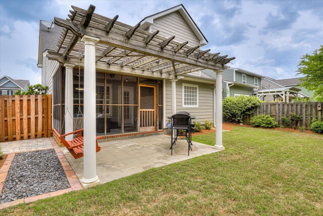 240 Full Circle Dr, Evans, GA 30809 - back of house featuring a pergola, a fenced backyard, a patio, and a sunroom