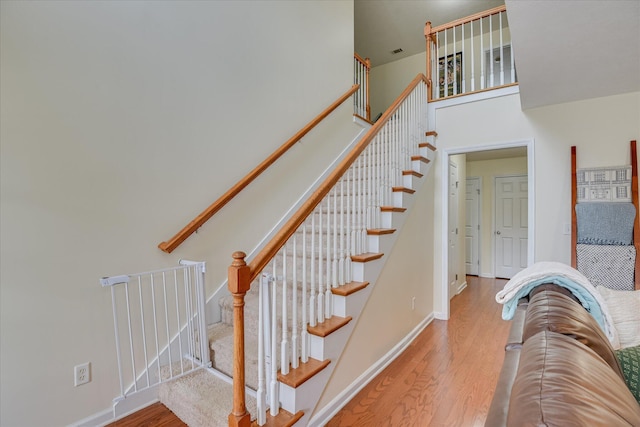 240 Full Circle Dr, Evans, GA 30809 - stairway with wood finished floors and a high ceiling
