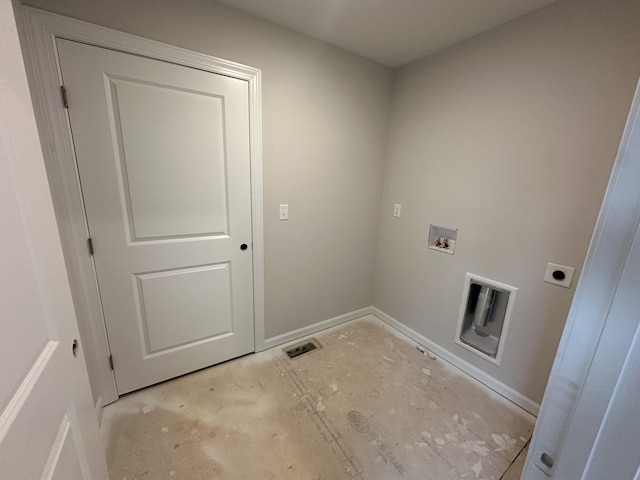 clothes washing area featuring laundry area, hookup for a washing machine, electric dryer hookup, and baseboards