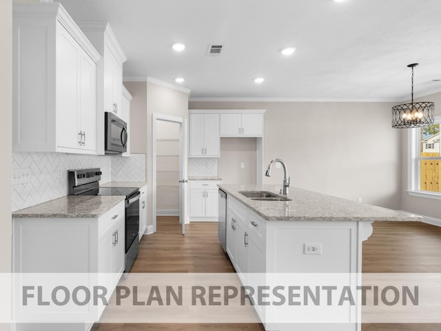 kitchen featuring light stone countertops, appliances with stainless steel finishes, sink, a center island with sink, and white cabinetry