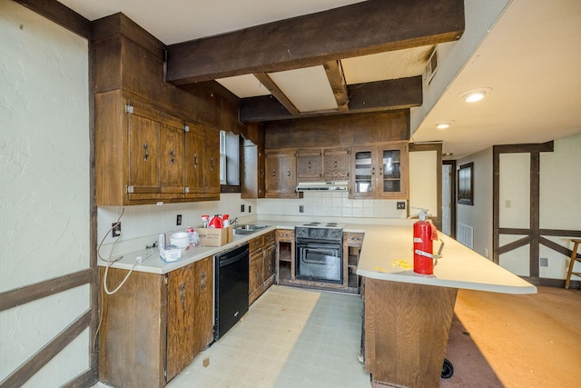 kitchen featuring a breakfast bar area, a peninsula, light countertops, dishwasher, and glass insert cabinets