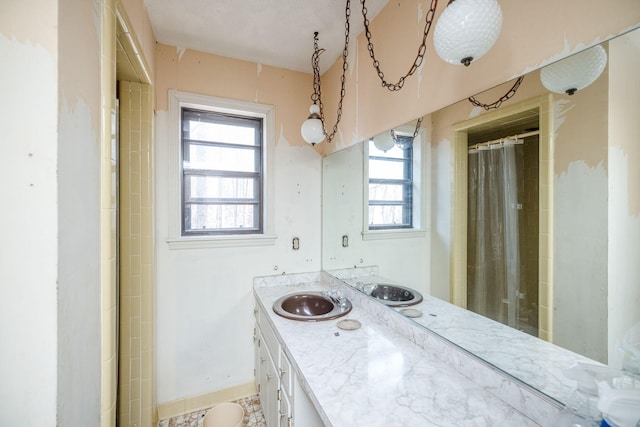 bathroom with vanity and a shower with curtain