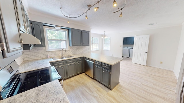 3904 Loblolly Trl, Martinez, GA 30907 - kitchen featuring stainless steel appliances, gray cabinetry, a peninsula, tasteful backsplash, and a textured ceiling