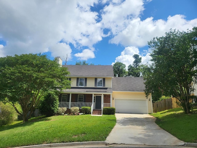 3904 Loblolly Trl, Martinez, GA 30907 - view of front of house featuring an attached garage, driveway, a porch, and a chimney