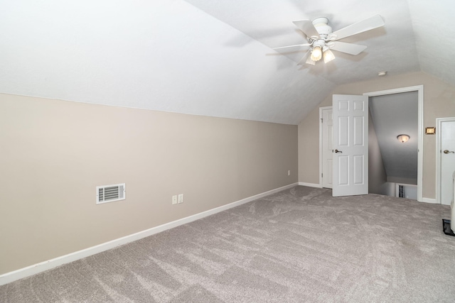 bonus room featuring vaulted ceiling, carpet floors, and ceiling fan