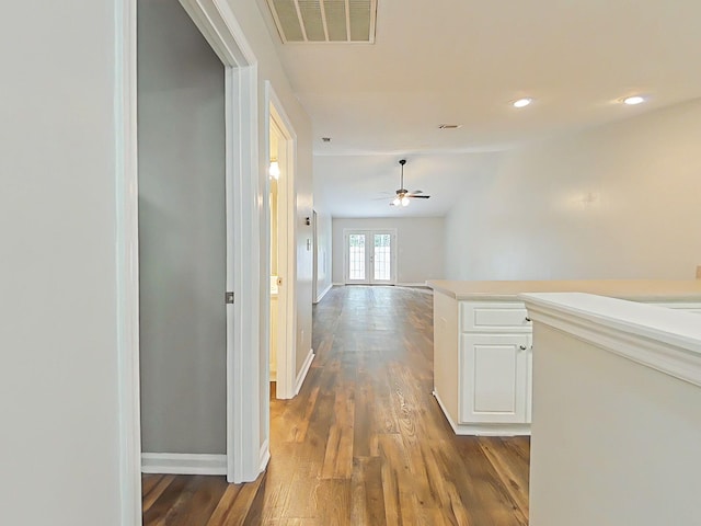 9025 Baker Ct, Augusta, GA 30909 - hallway with dark wood-type flooring, baseboards, and recessed lighting