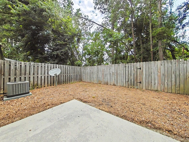 9025 Baker Ct, Augusta, GA 30909 - fenced backyard featuring central AC unit and a patio area