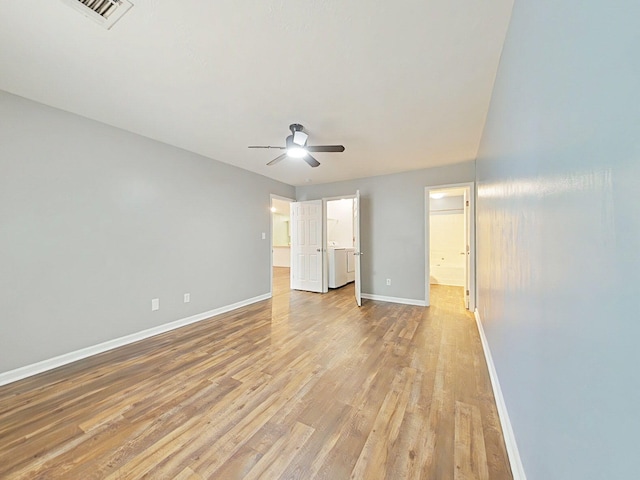 9025 Baker Ct, Augusta, GA 30909 - unfurnished bedroom with light wood finished floors, baseboards, ensuite bathroom, and a ceiling fan