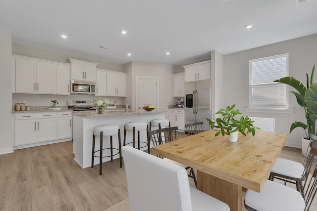 790 Count Fleet Ct, Graniteville, SC 29829 - dining area with light wood finished floors and recessed lighting