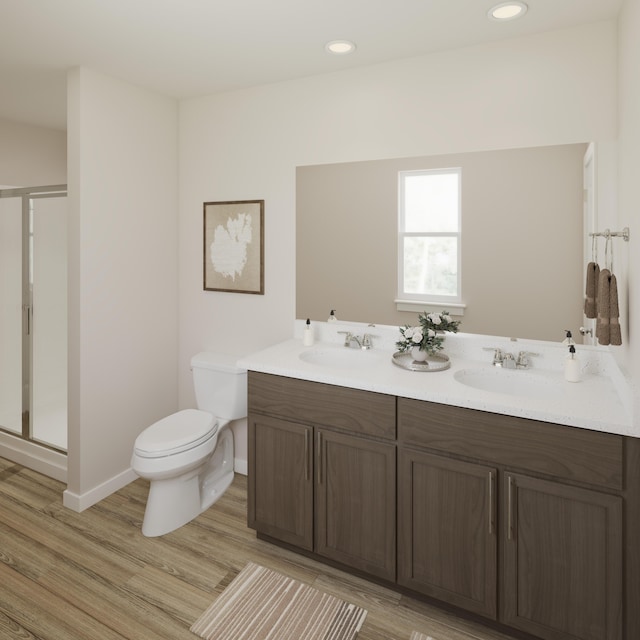 790 Count Fleet Ct, Graniteville, SC 29829 - full bath with wood finished floors, toilet, double vanity, baseboards, and recessed lighting