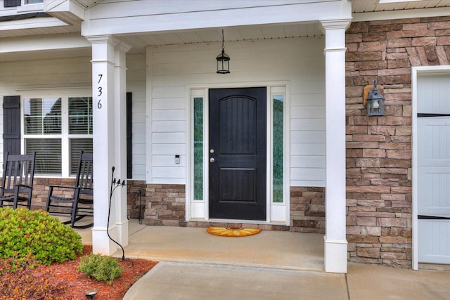 736 Courtland Ln, Harlem, GA 30814 - property entrance featuring a porch and stone siding