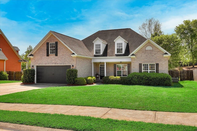 view of front facade featuring a garage, brick siding, fence, and concrete driveway