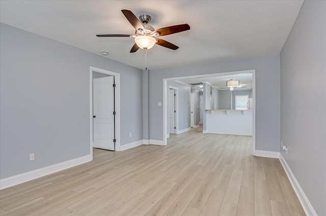 2120 Whitney S Dr, Augusta, GA 30904 - unfurnished living room with a ceiling fan and light wood finished floors