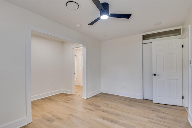 2281 Raleigh Dr, Augusta, GA 30904 - unfurnished bedroom with light wood-style floors, baseboards, ceiling fan, and connected bathroom