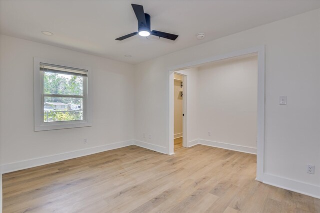 2281 Raleigh Dr, Augusta, GA 30904 - unfurnished room featuring ceiling fan, light wood finished floors, baseboards, and a smoke detector