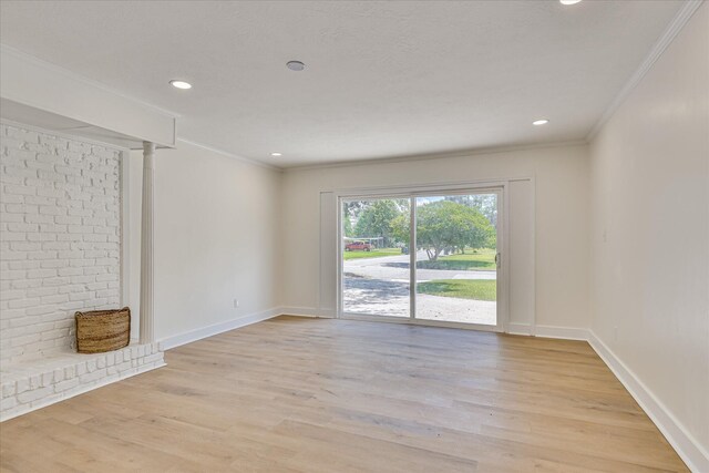 2281 Raleigh Dr, Augusta, GA 30904 - unfurnished living room with crown molding, light wood-style floors, baseboards, and recessed lighting