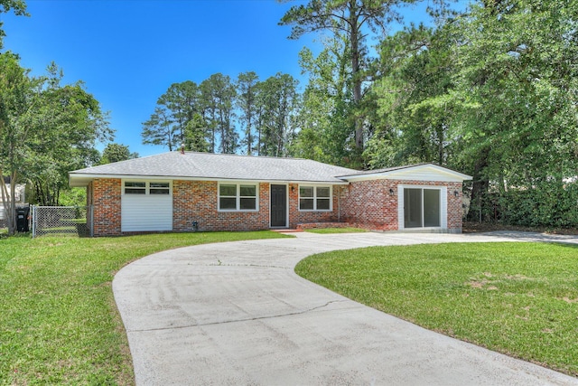 2281 Raleigh Dr, Augusta, GA 30904 - ranch-style home with curved driveway and brick siding
