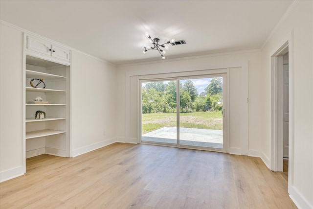 2281 Raleigh Dr, Augusta, GA 30904 - unfurnished dining area featuring light wood-style flooring, a chandelier, crown molding, and baseboards
