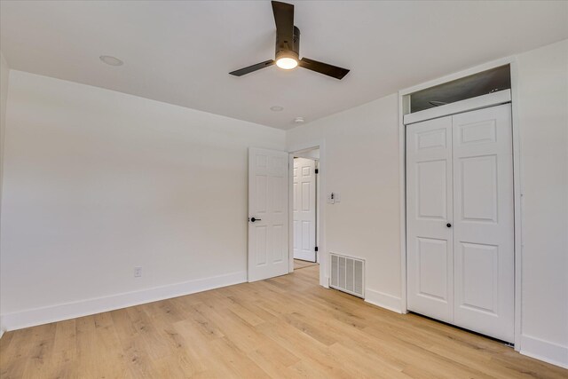 2281 Raleigh Dr, Augusta, GA 30904 - unfurnished bedroom featuring light wood-type flooring, baseboards, a closet, and ceiling fan
