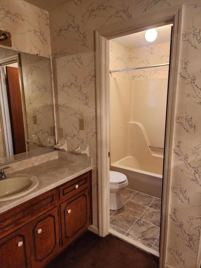 3747 Crest Dr, Hephzibah, GA 30815 - full bathroom featuring vanity, toilet, and shower / washtub combination