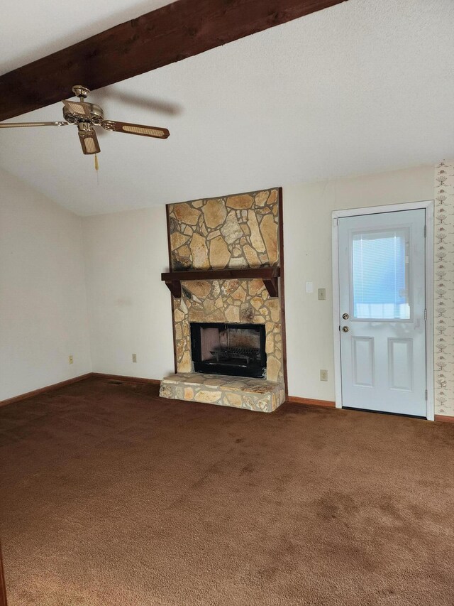 3747 Crest Dr, Hephzibah, GA 30815 - unfurnished living room featuring carpet flooring, ceiling fan, a fireplace, beamed ceiling, and baseboards