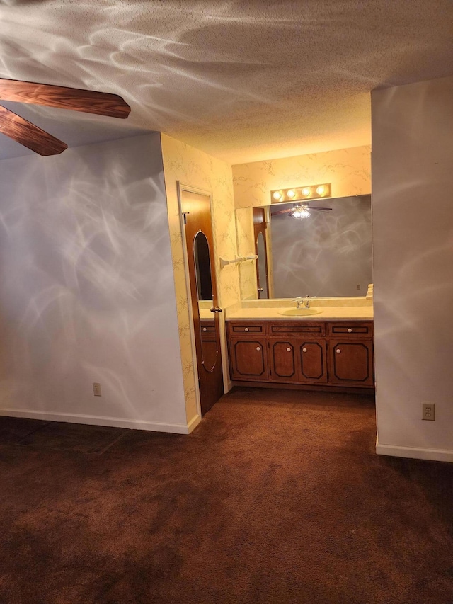 3747 Crest Dr, Hephzibah, GA 30815 - bathroom with vanity, baseboards, and a textured ceiling