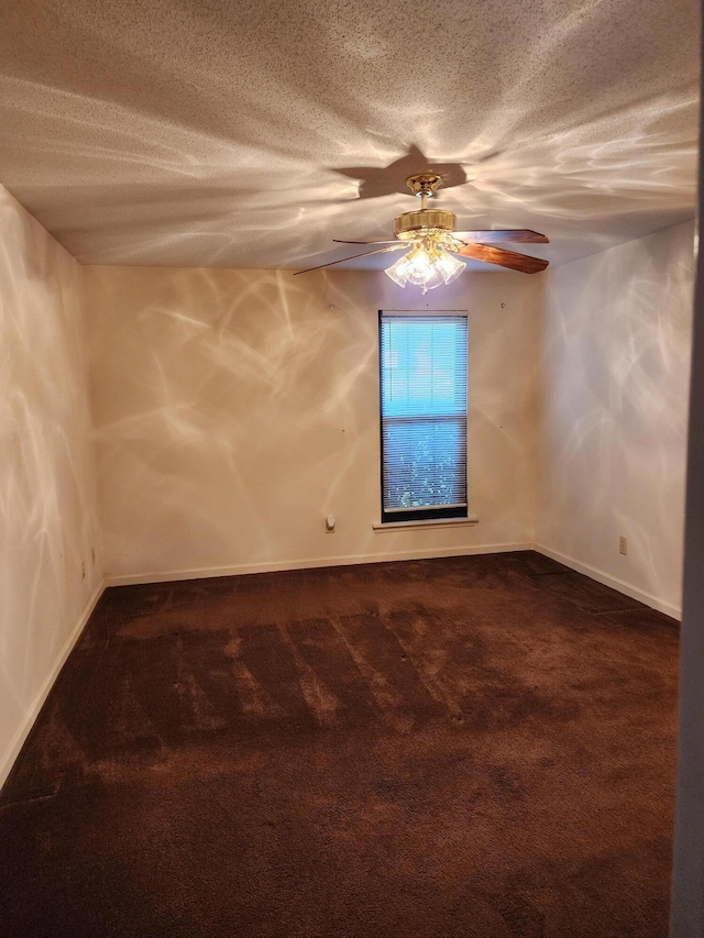 3747 Crest Dr, Hephzibah, GA 30815 - empty room with dark carpet, a textured ceiling, baseboards, and ceiling fan