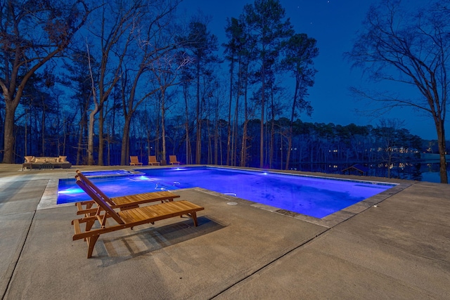 view of pool featuring a patio area