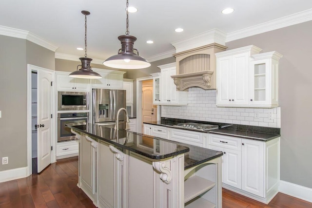 322 Pump House Rd, Evans, GA 30809 - kitchen featuring stainless steel appliances, an island with sink, tasteful backsplash, glass insert cabinets, and recessed lighting