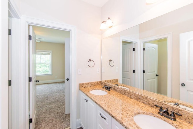 322 Pump House Rd, Evans, GA 30809 - bathroom with double vanity and baseboards