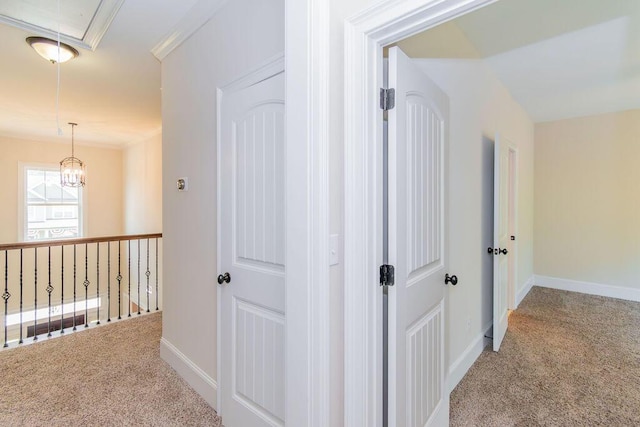 322 Pump House Rd, Evans, GA 30809 - hallway featuring carpet floors, attic access, and a chandelier