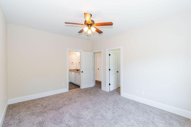 322 Pump House Rd, Evans, GA 30809 - unfurnished bedroom with carpet flooring, connected bathroom, and ceiling fan