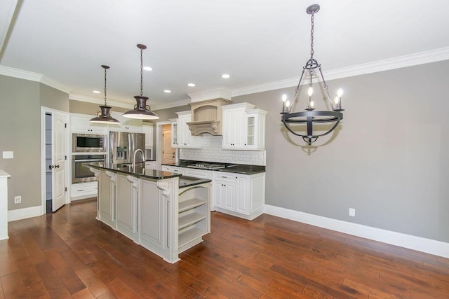 322 Pump House Rd, Evans, GA 30809 - kitchen with dark countertops, a chandelier, decorative backsplash, stainless steel appliances, and crown molding
