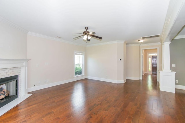 322 Pump House Rd, Evans, GA 30809 - unfurnished living room featuring decorative columns, ornamental molding, ceiling fan, dark wood-type flooring, and a fireplace