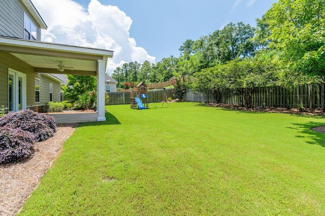322 Pump House Rd, Evans, GA 30809 - fenced backyard featuring a ceiling fan and a playground