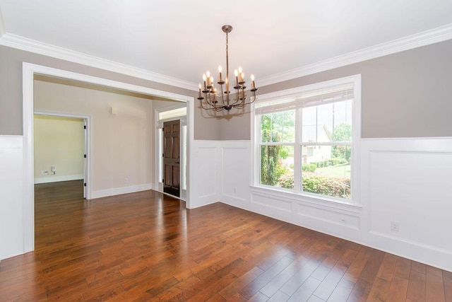322 Pump House Rd, Evans, GA 30809 - spare room with a chandelier, dark wood-style floors, a wainscoted wall, crown molding, and a decorative wall