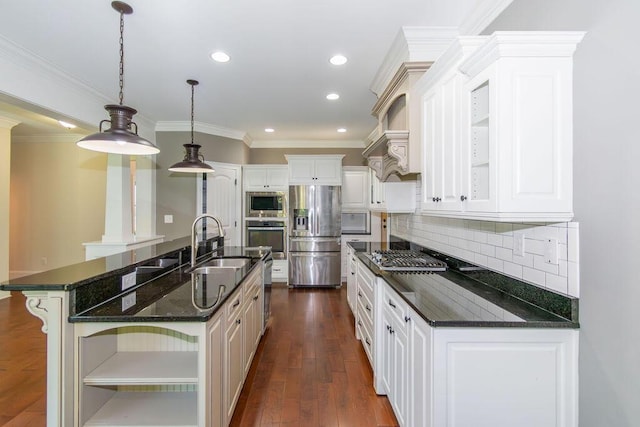 322 Pump House Rd, Evans, GA 30809 - kitchen with open shelves, stainless steel appliances, decorative backsplash, a kitchen island with sink, and decorative light fixtures