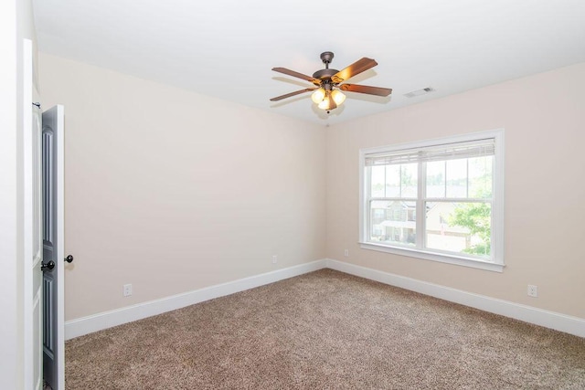 322 Pump House Rd, Evans, GA 30809 - carpeted spare room with baseboards and ceiling fan