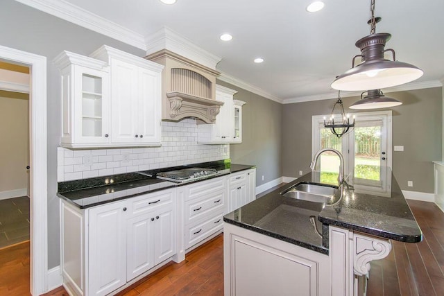 322 Pump House Rd, Evans, GA 30809 - kitchen with tasteful backsplash, an island with sink, white cabinetry, glass insert cabinets, and recessed lighting