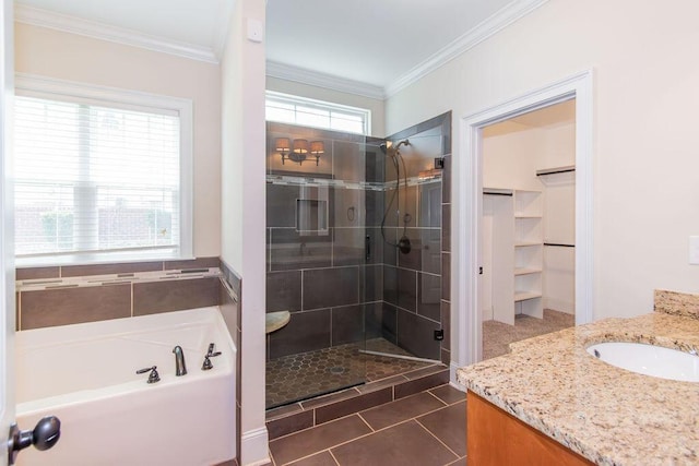 322 Pump House Rd, Evans, GA 30809 - full bathroom featuring vanity, a garden tub, a stall shower, crown molding, and a walk in closet