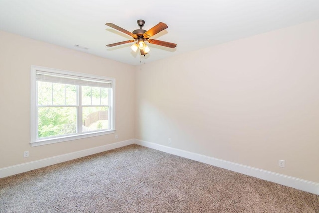 322 Pump House Rd, Evans, GA 30809 - carpeted spare room with baseboards and ceiling fan