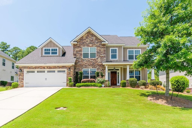 322 Pump House Rd, Evans, GA 30809 - craftsman-style house featuring roof with shingles, driveway, a front lawn, a garage, and board and batten siding