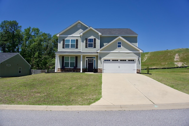 4042 Cottingham Way, Augusta, GA 30909 - craftsman-style home with board and batten siding, driveway, covered porch, and stone siding